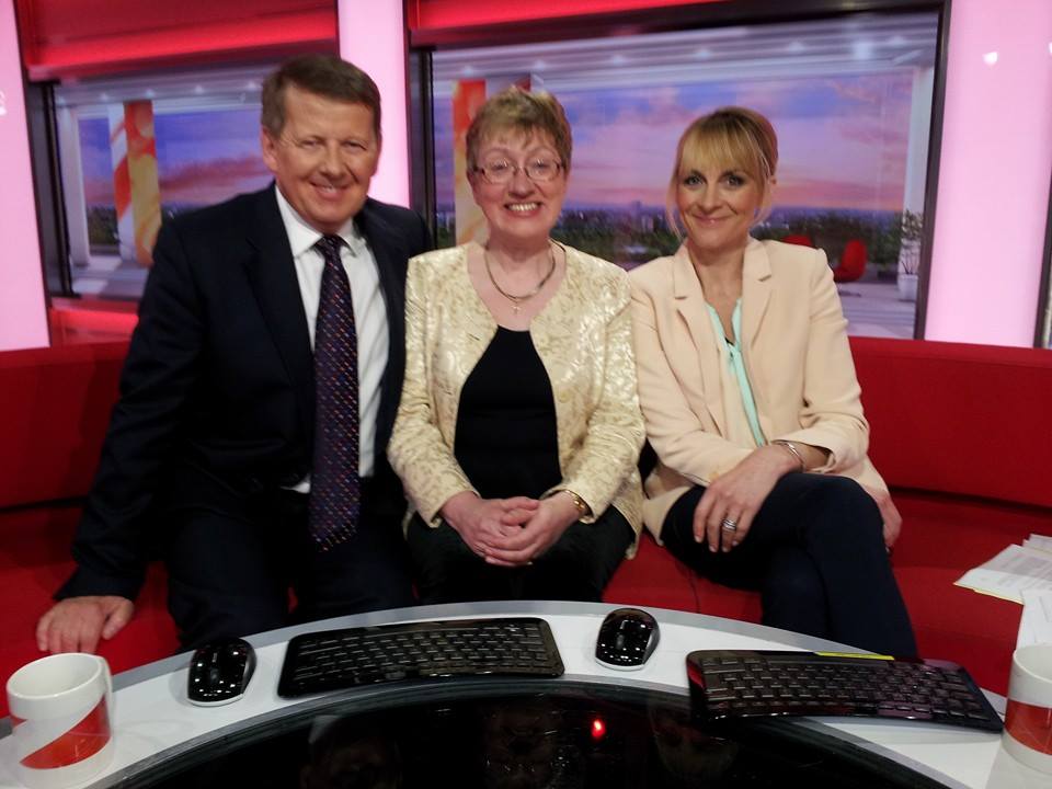 Catherine on the red sofa
